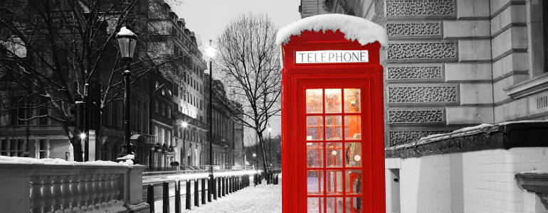 Red telephone box at winter